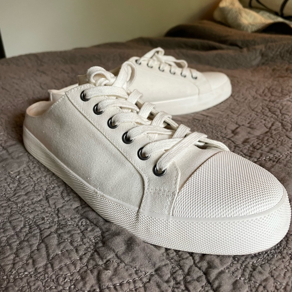 White canvas sneaker slides